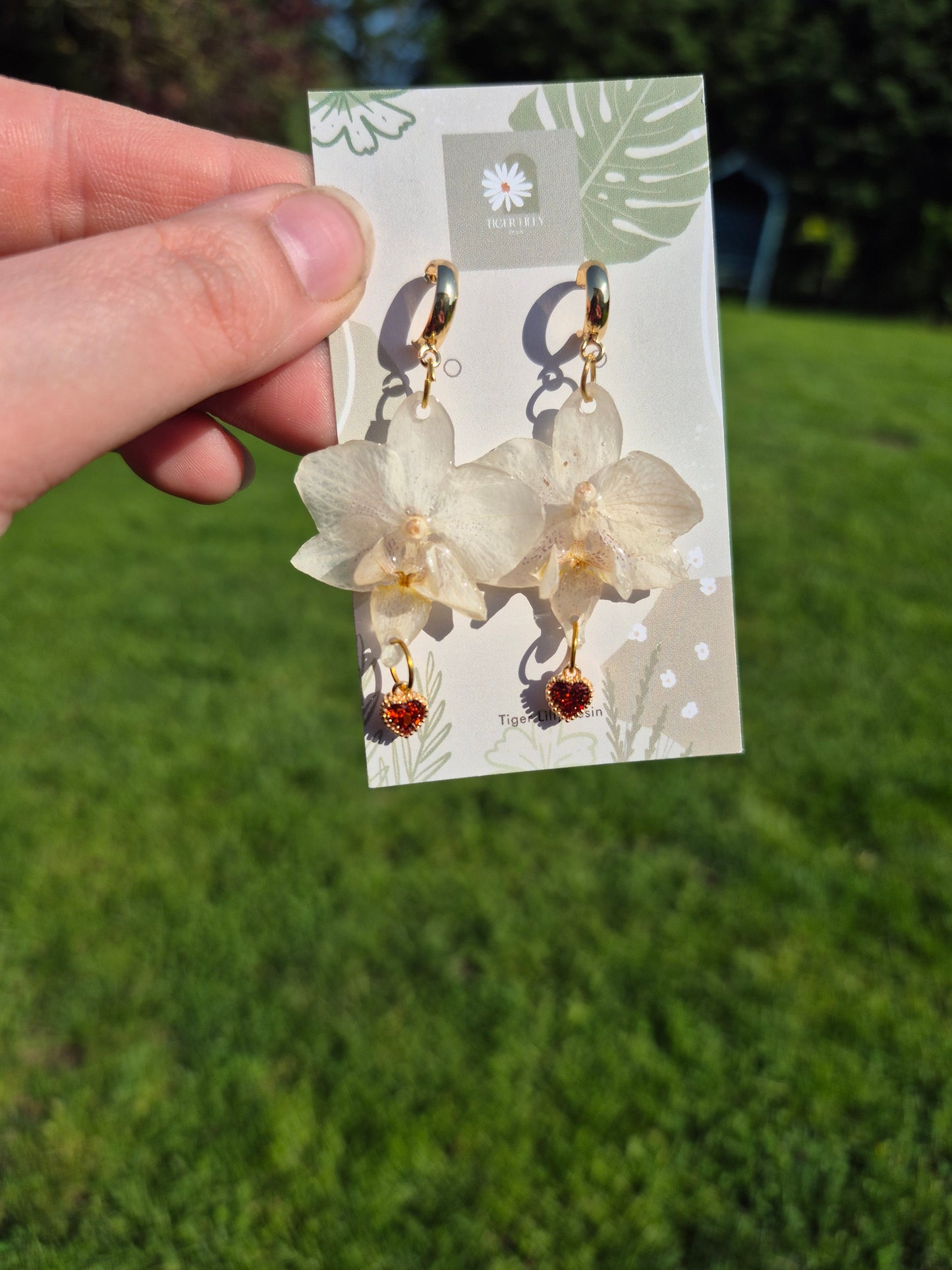 White phalaenopsis orchid heart dangles