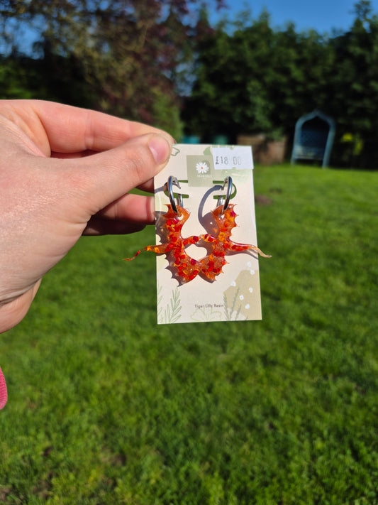 Red petal metallic dragon hoop earrings