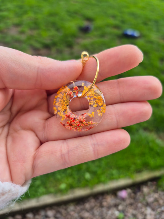 Real orange floral hoop charms