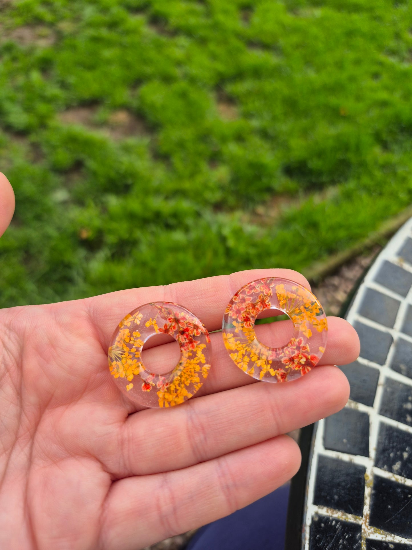 Real orange floral hoop charms