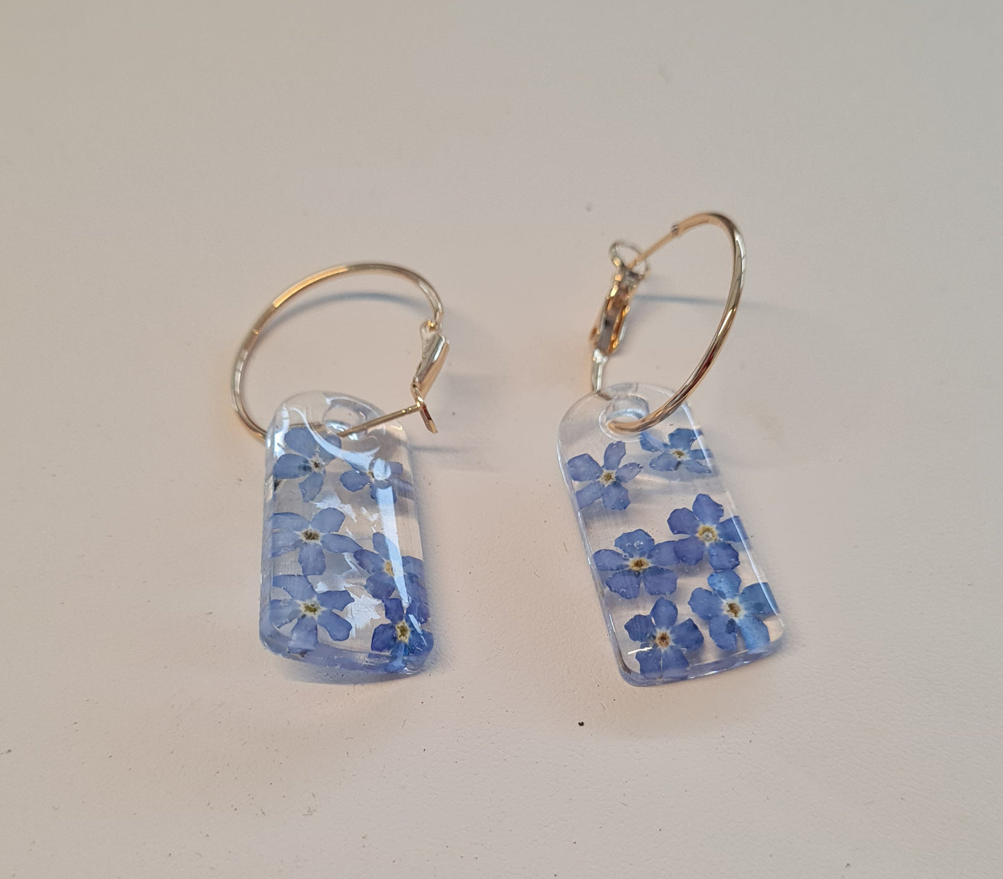 forget me not arch earrings