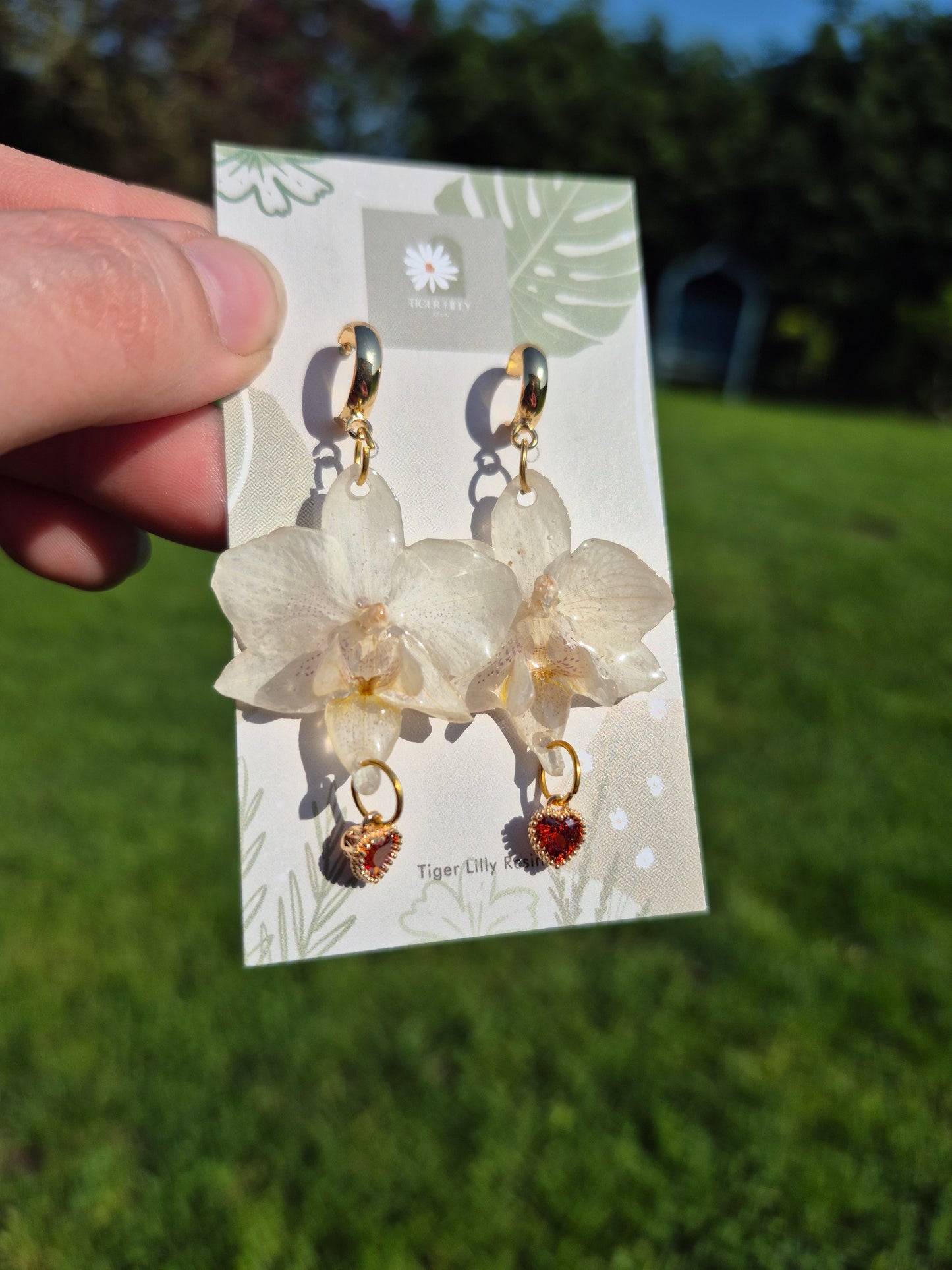 White phalaenopsis orchid heart dangles