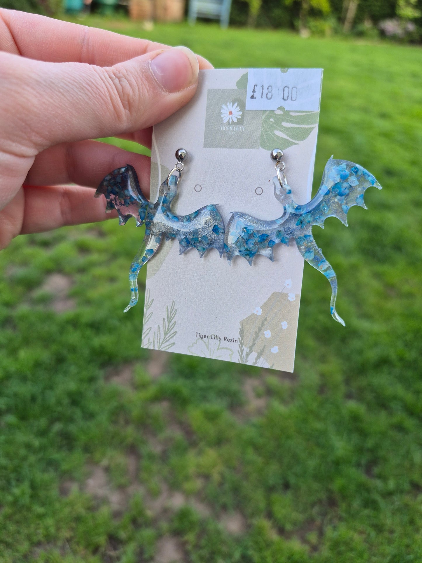 Blue petal metallic dragon earrings