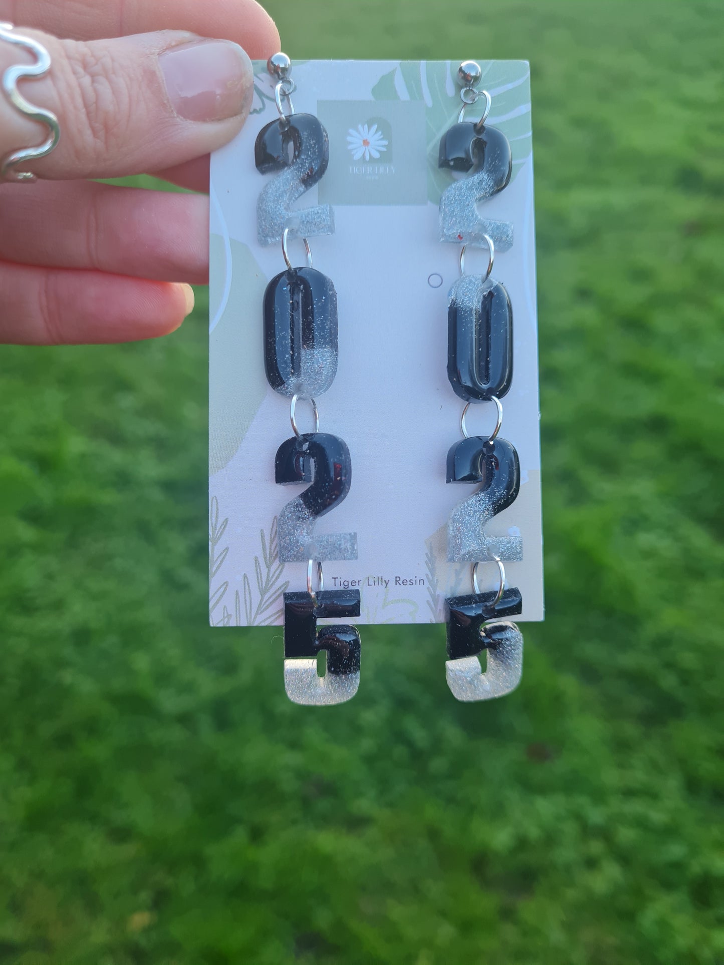 2025 silver and black earrings