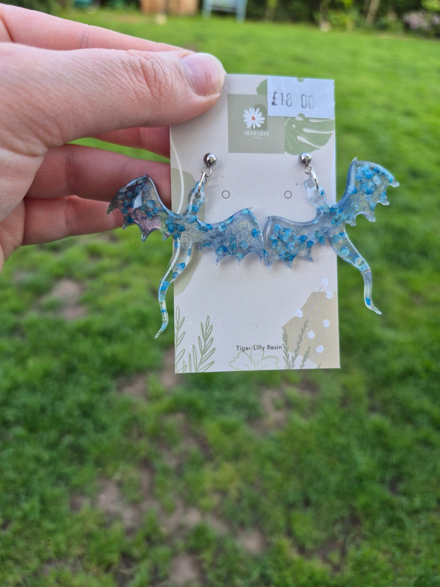 Blue petal metallic dragon earrings