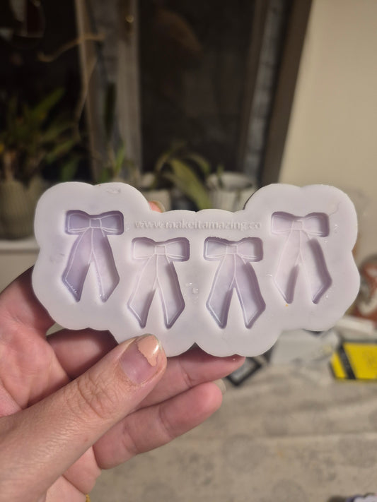 Bow stud mould