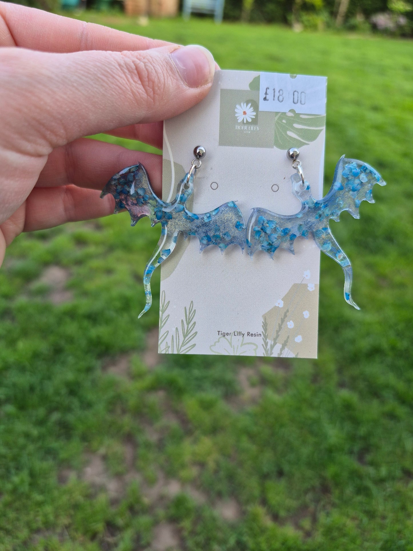 Blue petal metallic dragon earrings