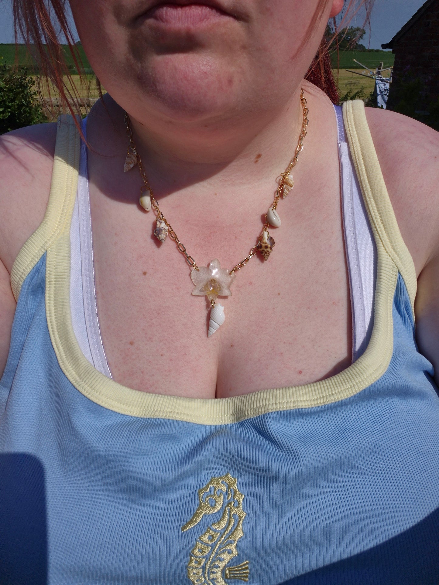 Small phalaenopsis orchid sea shell necklace