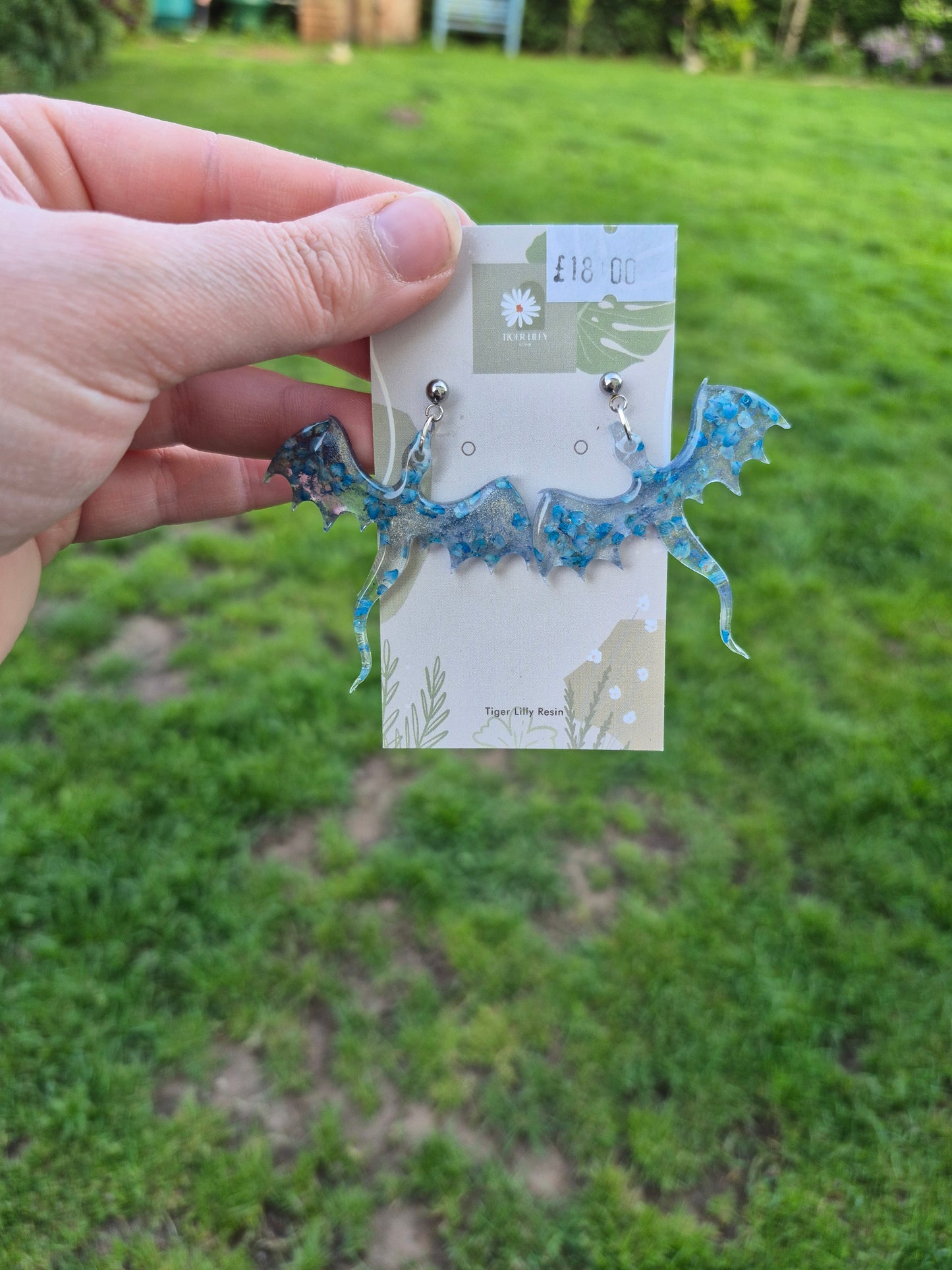 Blue petal metallic dragon earrings