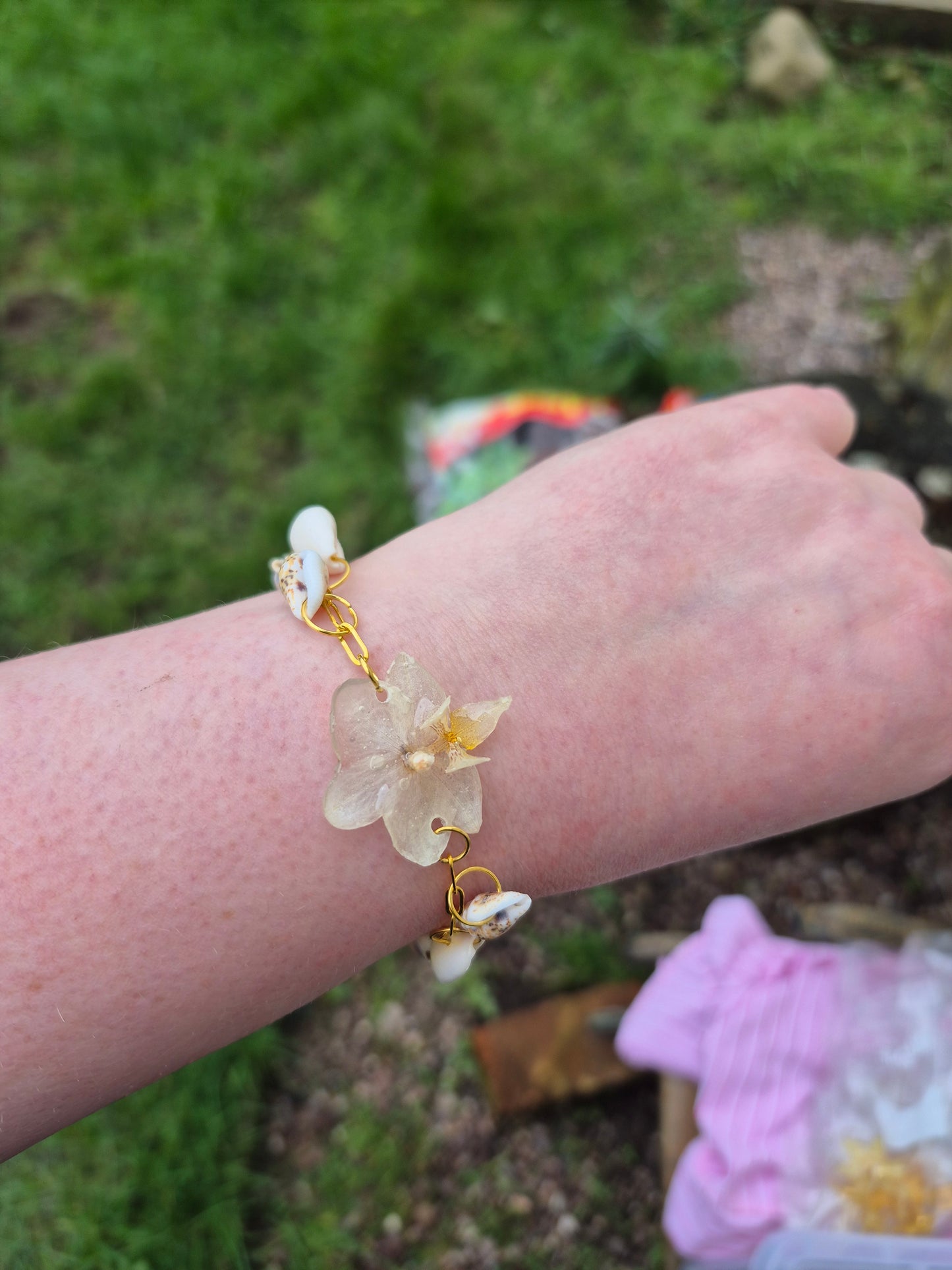 Small phalaenopsis sea shell charm bracelet