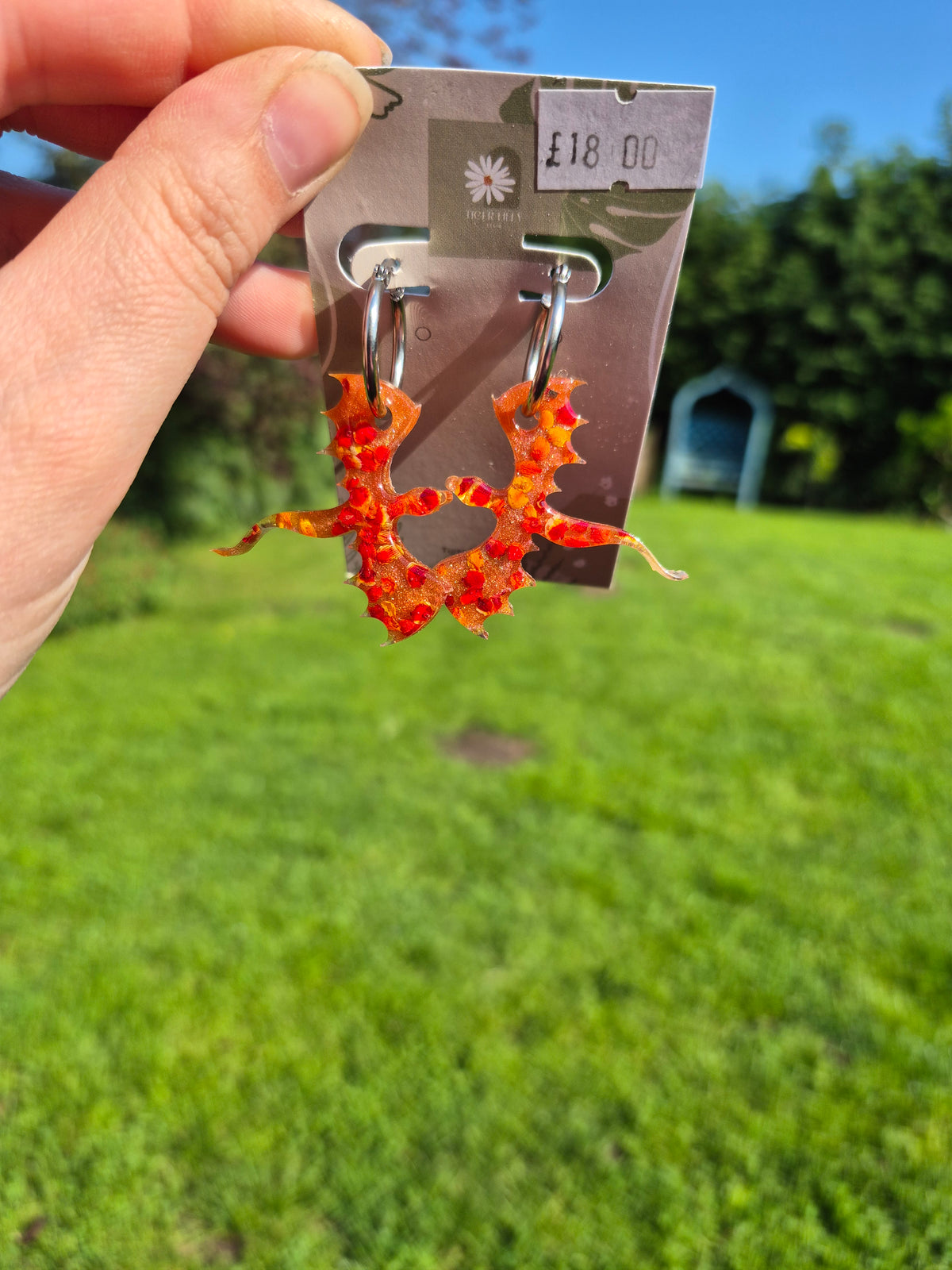 Red petal metallic dragon hoop earrings